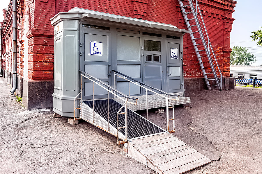 portable toilet beside the building