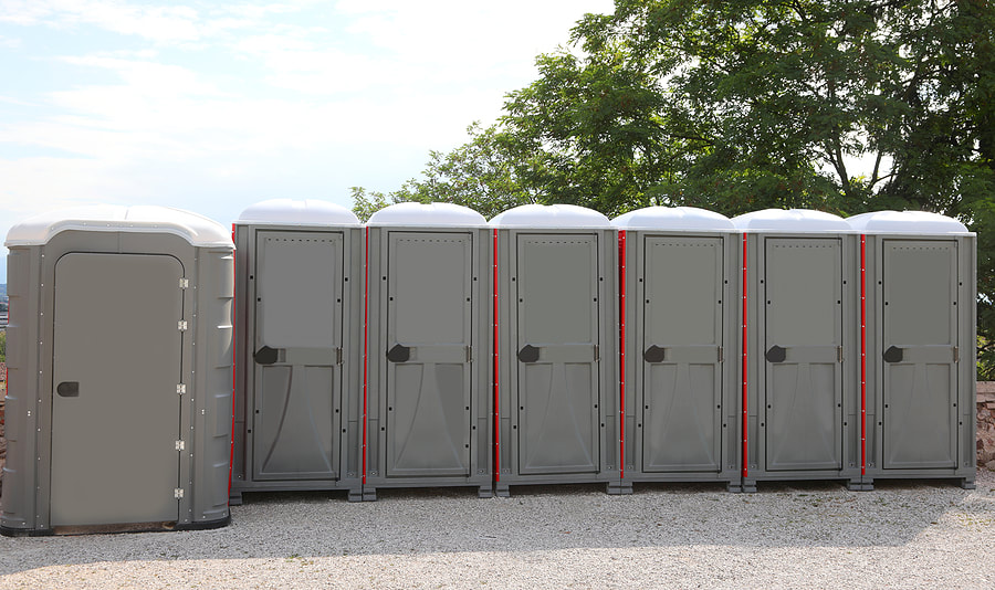 portable toilets beside the wall